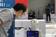 北京科技周的明星机器人“小科”：有一点幽默
