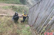 铁路人国庆雨中巡查排险记：一身雨衣、一把铁锹保安全畅通