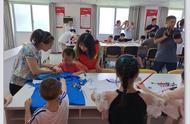 江津桥南社区举行“我的社区 我的家”儿童手绘T恤DIY环保活动